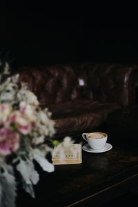 Preview wallpaper cup, coffee, book, bouquet, table