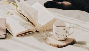 Preview wallpaper cup, coffee, book, pages, cat