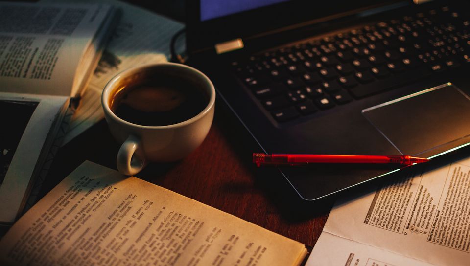 960x544 Wallpaper cup, coffee, books, pen, laptop