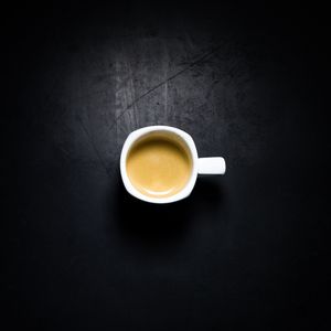 Preview wallpaper cup, coffee, table, top view, foam, black, white, shadow, minimalism