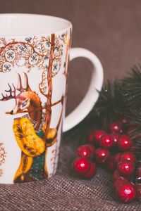 Preview wallpaper cup, deer, branch, candle, christmas