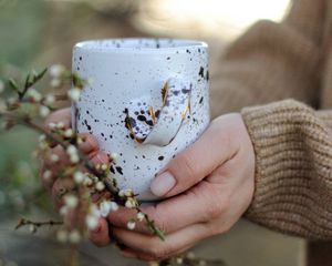 Preview wallpaper cup, flowers, hands, spring