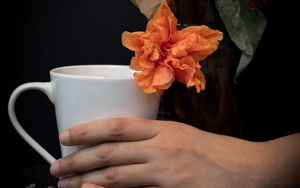 Preview wallpaper cup, hand, flowers, dark