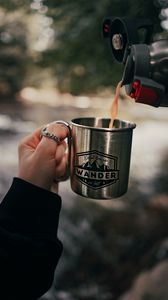 Preview wallpaper cup, hand, thermos, camping, focus
