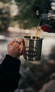 Preview wallpaper cup, hand, thermos, camping, focus