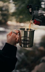 Preview wallpaper cup, hand, thermos, camping, focus
