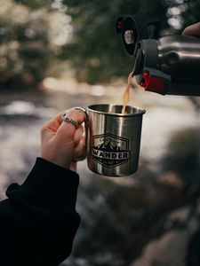 Preview wallpaper cup, hand, thermos, camping, focus