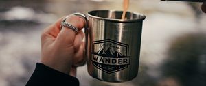 Preview wallpaper cup, hand, thermos, camping, focus