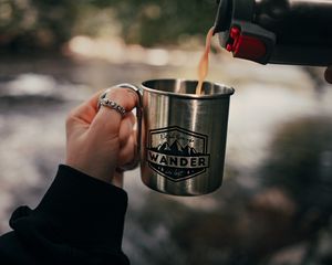 Preview wallpaper cup, hand, thermos, camping, focus