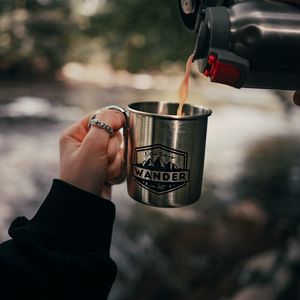 Preview wallpaper cup, hand, thermos, camping, focus