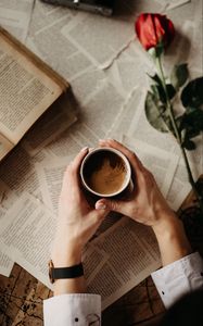 Preview wallpaper cup, hands, book, page, flower