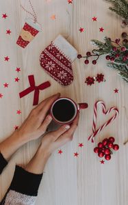 Preview wallpaper cup, hands, decoration, new year, christmas