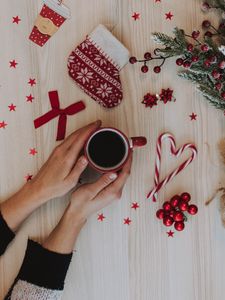 Preview wallpaper cup, hands, decoration, new year, christmas