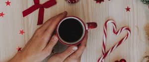 Preview wallpaper cup, hands, decoration, new year, christmas