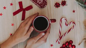 Preview wallpaper cup, hands, decoration, new year, christmas
