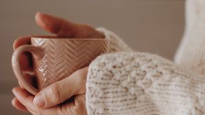 Preview wallpaper cup, hands, sweater