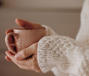 Preview wallpaper cup, hands, sweater