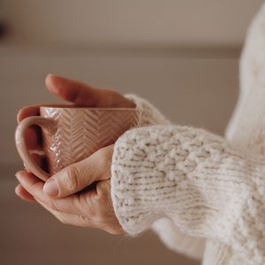 Preview wallpaper cup, hands, sweater