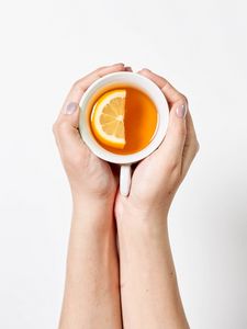 Preview wallpaper cup, hands, tea, lemon, drink