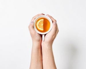 Preview wallpaper cup, hands, tea, lemon, drink