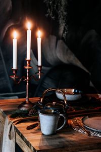 Preview wallpaper cup, kettle, candles, table