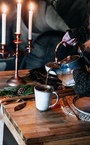 Preview wallpaper cup, kettle, tea, hands, candles