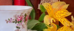 Preview wallpaper cup, lilies, book, text, aesthetics