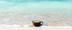 Preview wallpaper cup, ocean, sand, coast, minimalism