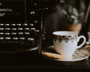 Preview wallpaper cup, saucer, cookies, typewriter, keys