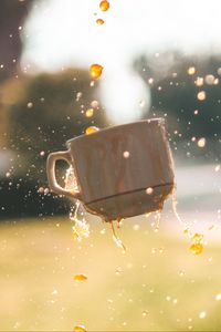 Preview wallpaper cup, spray, liquid, drops