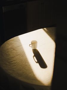 Preview wallpaper cup, table, light, shadow, aesthetics