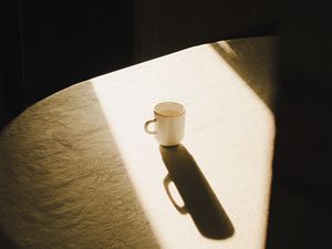 Preview wallpaper cup, table, light, shadow, aesthetics