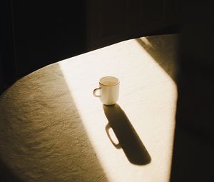 Preview wallpaper cup, table, light, shadow, aesthetics