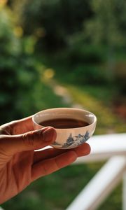 Preview wallpaper cup, tea, hand, drink