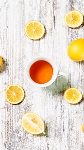 Preview wallpaper cup, tea, lemons, slices, citrus
