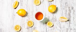 Preview wallpaper cup, tea, lemons, slices, citrus