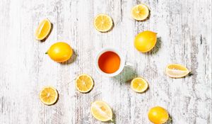 Preview wallpaper cup, tea, lemons, slices, citrus