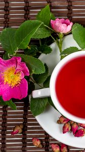 Preview wallpaper cup, tea, rosehip, flowers