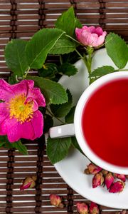 Preview wallpaper cup, tea, rosehip, flowers