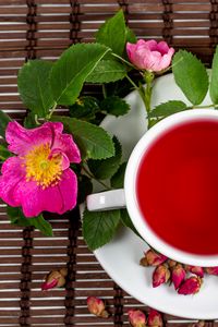 Preview wallpaper cup, tea, rosehip, flowers