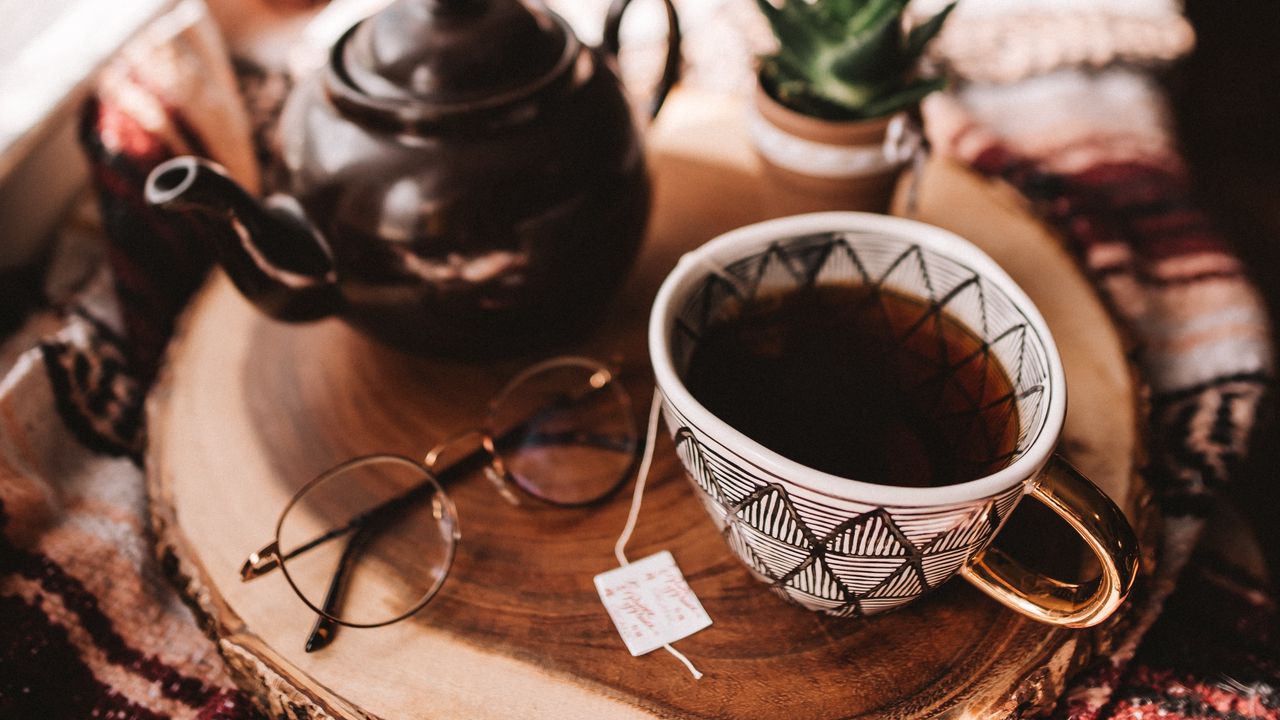 Wallpaper cup, teapot, still life
