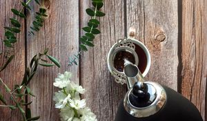 Preview wallpaper cup, teapot, tea, hand, flowers