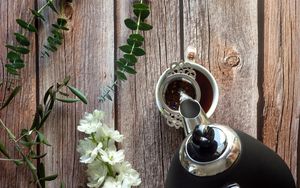 Preview wallpaper cup, teapot, tea, hand, flowers