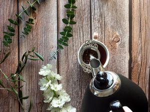 Preview wallpaper cup, teapot, tea, hand, flowers