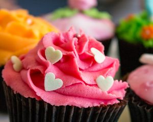 Preview wallpaper cupcake, cake, cream, sprinkling, hearts, pink, dessert