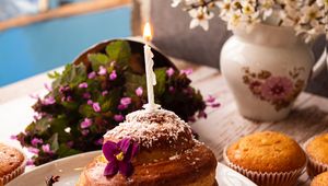 Preview wallpaper cupcake, candle, flowers, dessert