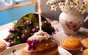 Preview wallpaper cupcake, candle, flowers, dessert