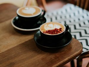 Preview wallpaper cups, cappuccino, table, wooden