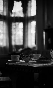 Preview wallpaper cups, table, blur, black and white, dark