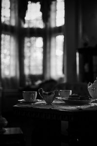 Preview wallpaper cups, table, blur, black and white, dark